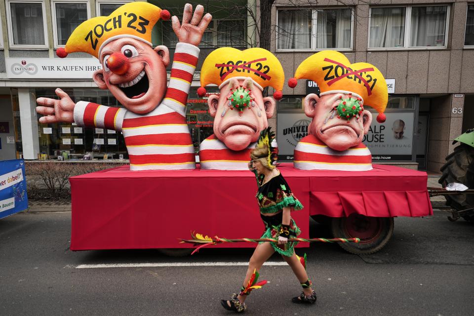 A carnival float depicting the 2-years cancelled carnival parades due to the coronavirus is seen ahead of the start of the traditional carnival parade in Duesseldorf, Germany, on Monday, Feb. 20, 2023. The foolish street spectacles in the carnival centers of Duesseldorf, Mainz and Cologne, watched by hundreds of thousands of people, are the highlights in Germany's carnival season on Rosemonday. (AP Photo/Martin Meissner)