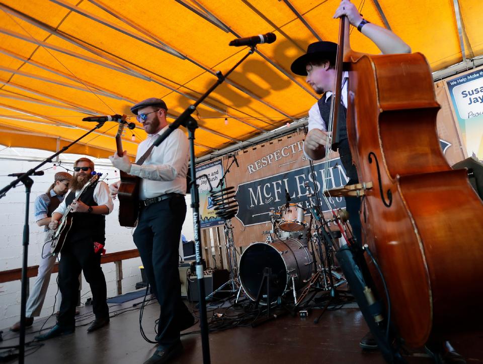 The Gentleman’s Anti-Temperance League performs at McFleshman’s Brewing Company during the first day of Mile of Music 9 on Aug. 4 in Appleton. The music festival is featured in September's edition of Rolling Stone.