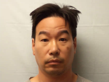 FILE PHOTO :Former New England Compounding Center supervisory pharmacist Glenn Chin is pictured in Canton, Massachusetts, U.S. in this undated handout booking photo obtained by Reuters September 19, 2017. Canton Police Department/Handout via REUTERS