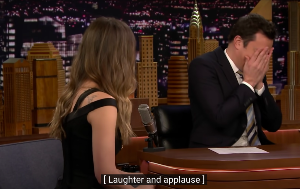 Jimmy covering his face with the caption "Laughter and applause"