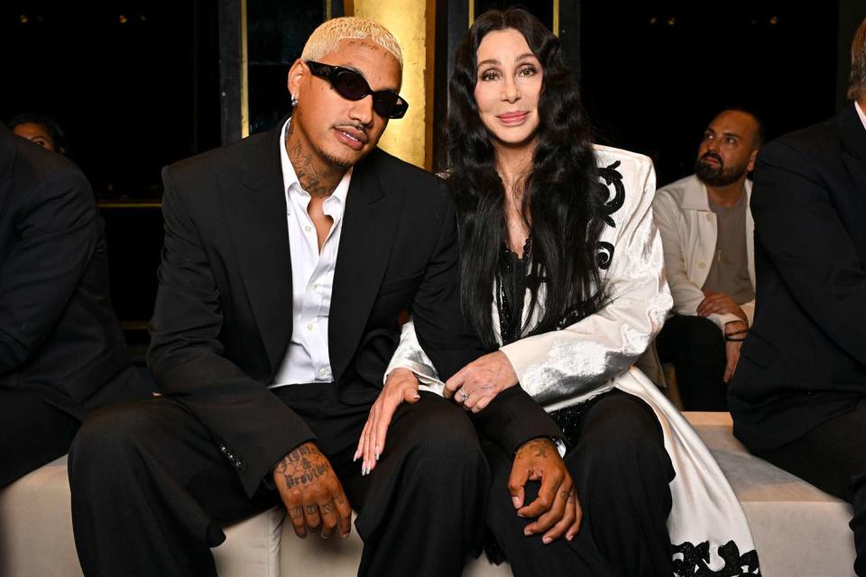 Cher Cozies Up to Boyfriend Alexander 'AE' Edwards Front Row at Balmain