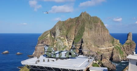 Members of South Korean Marine Corps take part in a military exercise in remote islands called Dokdo