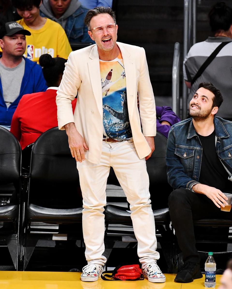 David Arquette practices next-level courtside style.