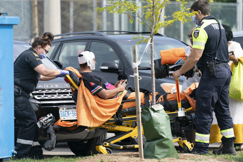 Toronto paramedics were on-scene at Earlscourt Park to help patients injured during the demonstration. (THE CANADIAN PRESS/Arlyn McAdorey)