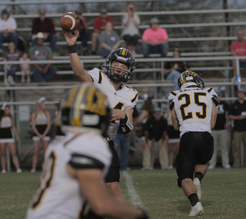 Cisco quarterback Hunter Long throws a screen pass in the first quarter of the Loboes' game against Coleman on Friday, Oct. 22. Long has combined for 38 touchdowns in 2021.