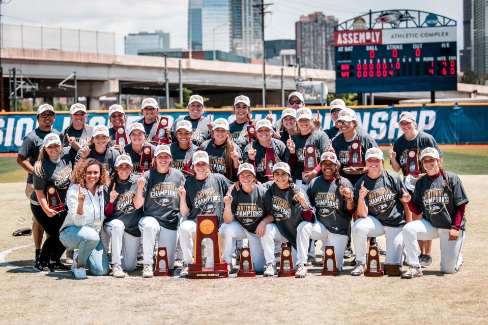 West Texas A&M's softball team poses with the championship trophy after defeating Biola 4-1 Tuesday, June 1, 2021, in the finale of the NCAA Division II Championship series at the Regency Athletic Complex in Denver, Colorado.