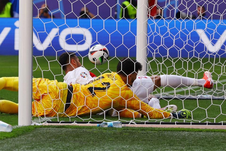 A communication breakdown led to embarrassment for Turkey goalkeeper Altay Bayindir. (REUTERS)