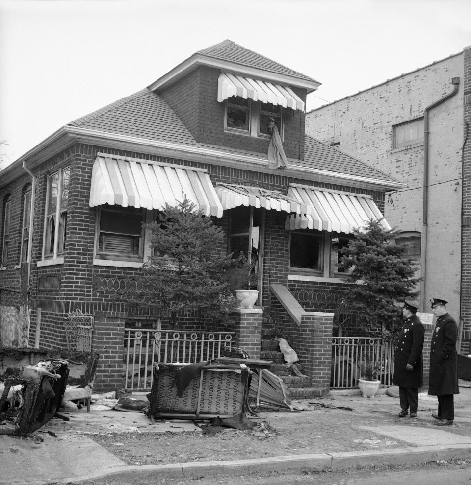 Home of Black Muslim leader Malcolm X is damaged after two fire bombs sparked a flash fire, Feb. 14, 1965 in New York City. Firemen quickly put out the flames.