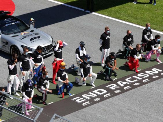 The six F1 drivers who chose not to stand made a mockery of the #WeRaceAsOne slogan (Getty)