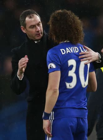 Britain Football Soccer - Chelsea v Swansea City - Premier League - Stamford Bridge - 25/2/17 Swansea City manager Paul Clement with Chelsea's David Luiz after the game Reuters / Peter Nicholls Livepic