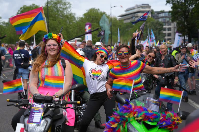 Participants on motorcycles gather for the Pride In London parade