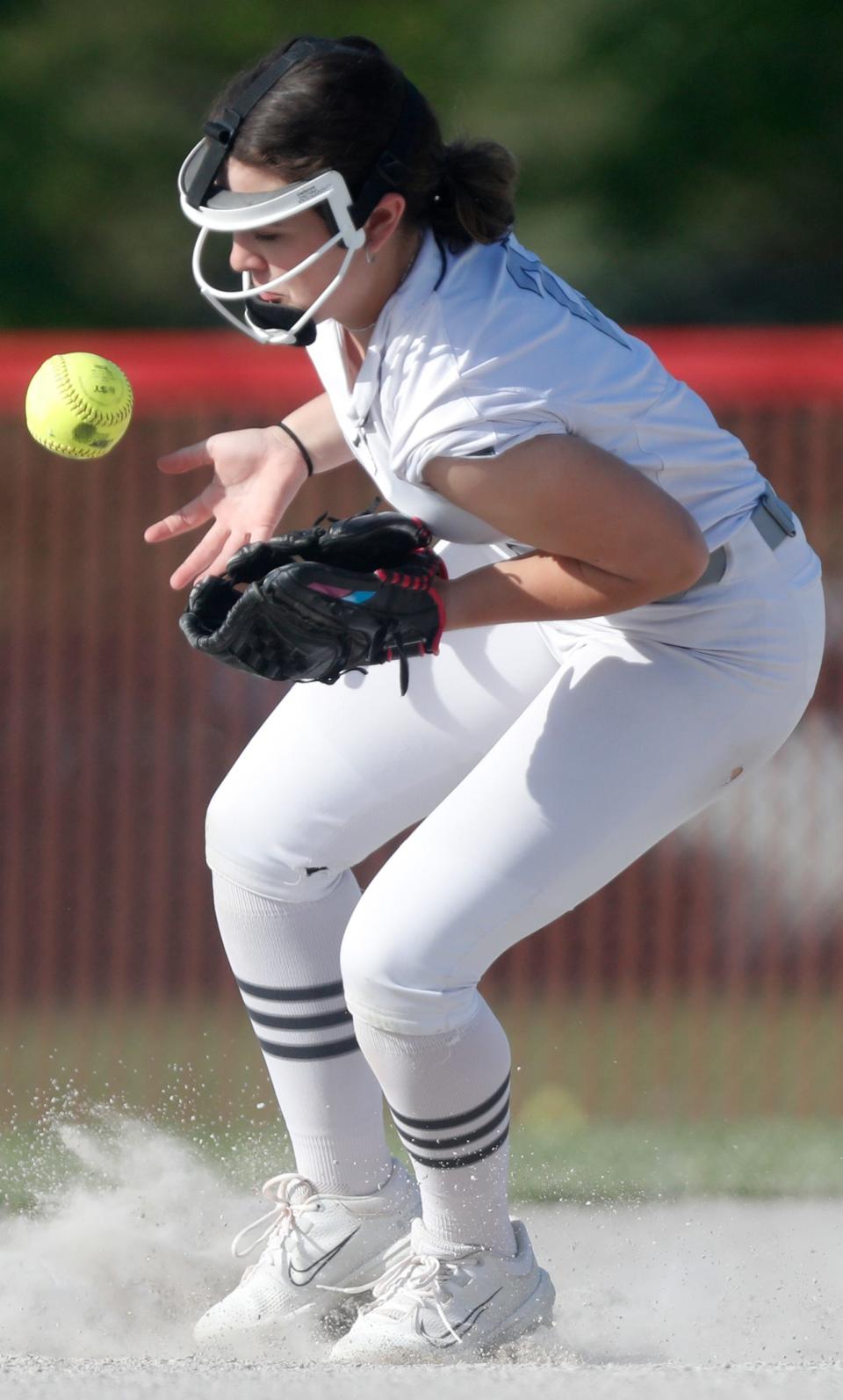 West Lafayette Red Devils Ellie Wilcoxson (2) goes to field a ground ball during the IHSAA softball game against the Tri-County Cavaliers, Wednesday, May 10, 2023, at West Lafayette High School in West Lafayette, Ind. West Lafayette won 15-7.