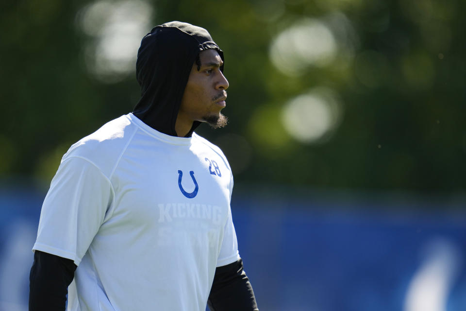 FILE - Indianapolis Colts running back Jonathan Taylor watches drills during practice at the NFL team's football training camp in Westfield, Ind., July 31, 2023. The Colts will activate the All-Pro running back this week and he could play Sunday, Oct. 8, against Tennessee. (AP Photo/Michael Conroy, file)