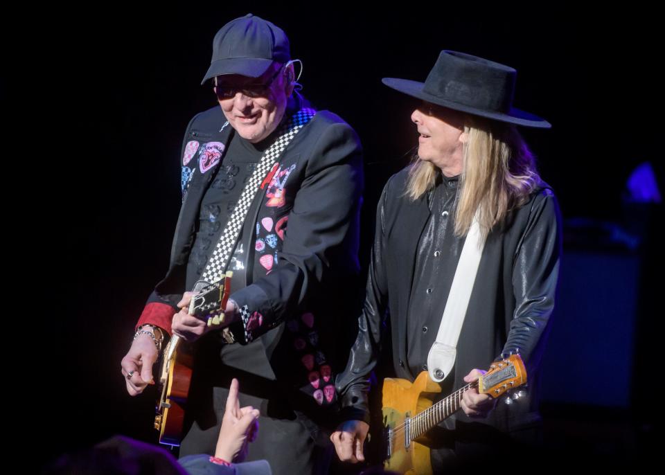 Rick Nielsen, left, and Robin Zander of Cheap Trick play together during the Rock Hall of Fame band's show Tuesday, April 25, 2023 at the Peoria Civic Center Theater.
