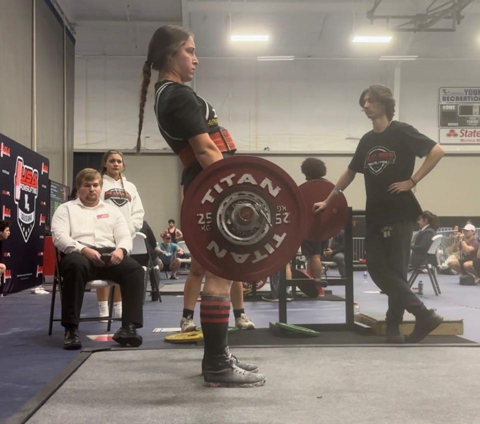 St. Mary's freshman Alyssa Brewtom recently captured first place in a state weightlifting meet.