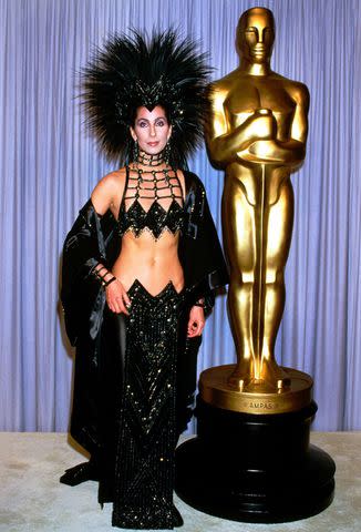 Alamy Cher at the 1986 Oscars.