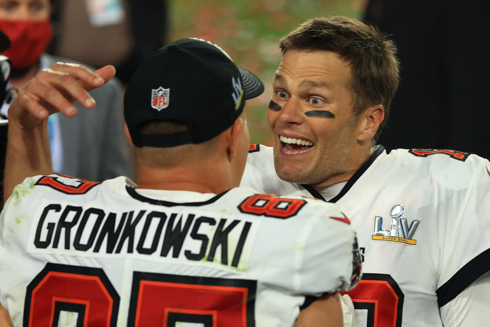 TAMPA, FLORIDA - FEBRUARY 07: Tom Brady #12 and Rob Gronkowski #87 of the Tampa Bay Buccaneers celebrate winning Super Bowl LV at Raymond James Stadium on February 07, 2021 in Tampa, Florida. (Photo by Mike Ehrmann/Getty Images)