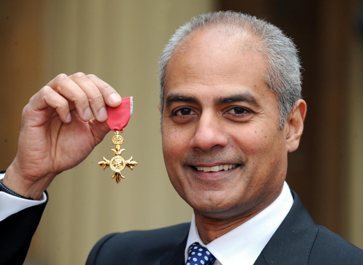 News reader George Alagiah at Buckingham Palace, after collecting his OBE from the Queen.