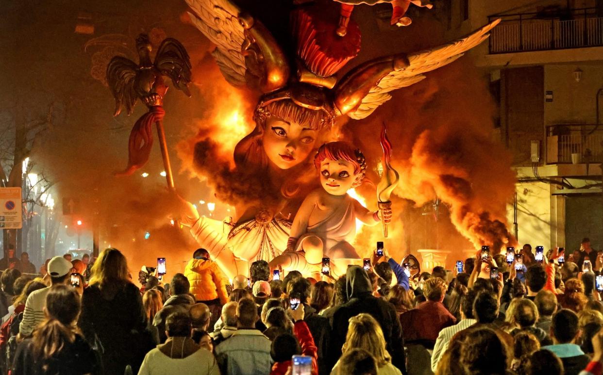 Cardboard figures are set alight during Fallas of Valencia - Mats Rennstam/Solent News & Photo Agency