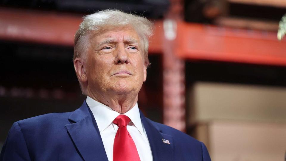 PHOTO: Republican presidential candidate former President Donald Trump speaks to guests during a campaign stop at Drake Enterprises, an automotive parts manufacturer, on Sept. 27, 2023, in Clinton Township, Michigan. (Scott Olson/Getty Images)