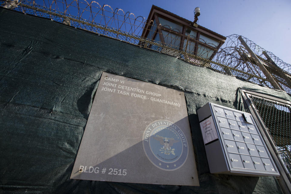 FILE - In this photo reviewed by U.S. military officials, the control tower of Camp VI detention facility is seen on April 17, 2019, in Guantanamo Bay Naval Base, Cuba. The first U.N. independent investigator to visit the U.S. detention center at Guantanamo Bay said Monday, June 26, 2023, that the 30 men held there are subject “to ongoing cruel, inhuman and degrading treatment under international law.” The U.S. response said Irish law professor Fionnuala Ní Aoláin was the first U.N. special rapporteur to visit Guantanamo and had been given “unprecedented access” with “the confidence that the conditions of confinement at Guantanamo Bay are humane and reflect the United States’ respect for and protection of human rights for all who are within our custody.” (AP Photo/Alex Brandon, File)