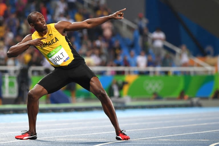 Jamaica's Usain Bolt poses after he won the men's 200m on August 18, 2016