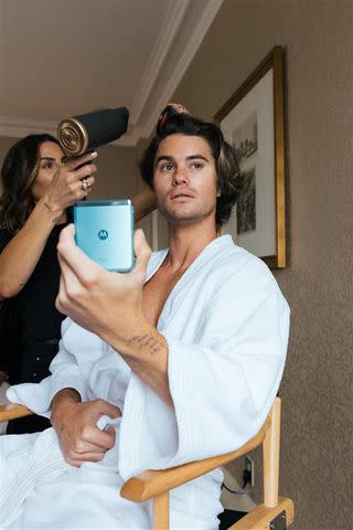 <p>Andrea Sabugo</p> Chase Stokes getting ready for the 2024 Met Gala with Motorola