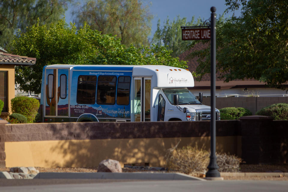 A transportation bus for Heritage Village Assisted Living outside of the Mesa facility.