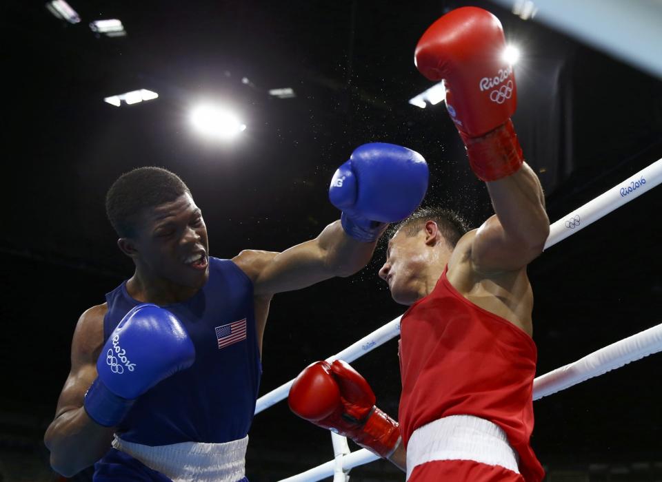 Russell seemed to Gary Russell appeared to thoroughly outbox Uzbekistan's Fazliddin Gaibnazarov. (Reuters) 