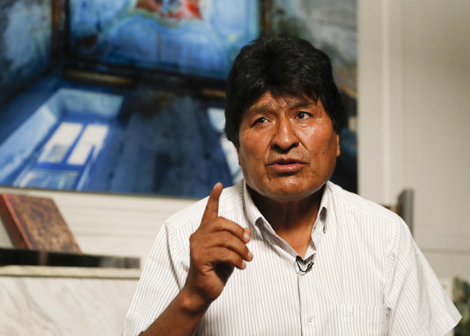 Former Bolivian President Evo Morales speaks during an interview with The Associated Press in Mexico City, Thursday, Nov. 14, 2019. Mexico granted asylum to Morales, who resigned on Nov. 10, under mounting pressure from the military and the public after his re-election victory triggered weeks of fraud allegations and deadly protests. (AP Photo/Eduardo Verdugo)