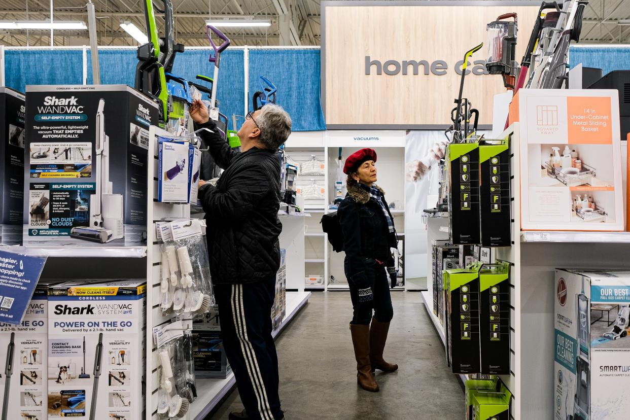 People shop for vacuum cleaners at a Bed Bath & Beyond store in New York on January 5, 2023. (Photo by Ziyu Julian Zhu/Xinhua via Getty Images)