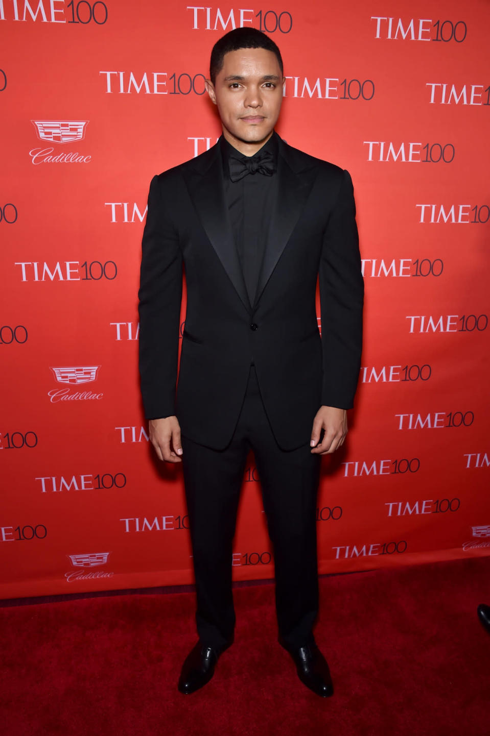 Trevor Noah in head-to-toe black