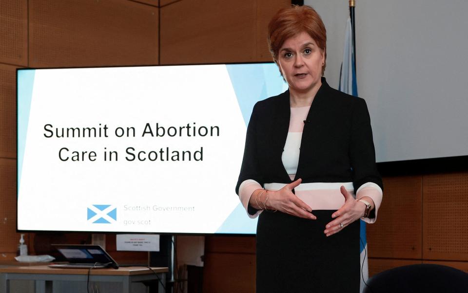 Nicola Sturgeon, pictured addressing an Abortion Summit at Scottish government offices in Leith on Tuesday, has faced criticism from her predecessor, Alex Salmond - Jeff Mitchell/Reuters