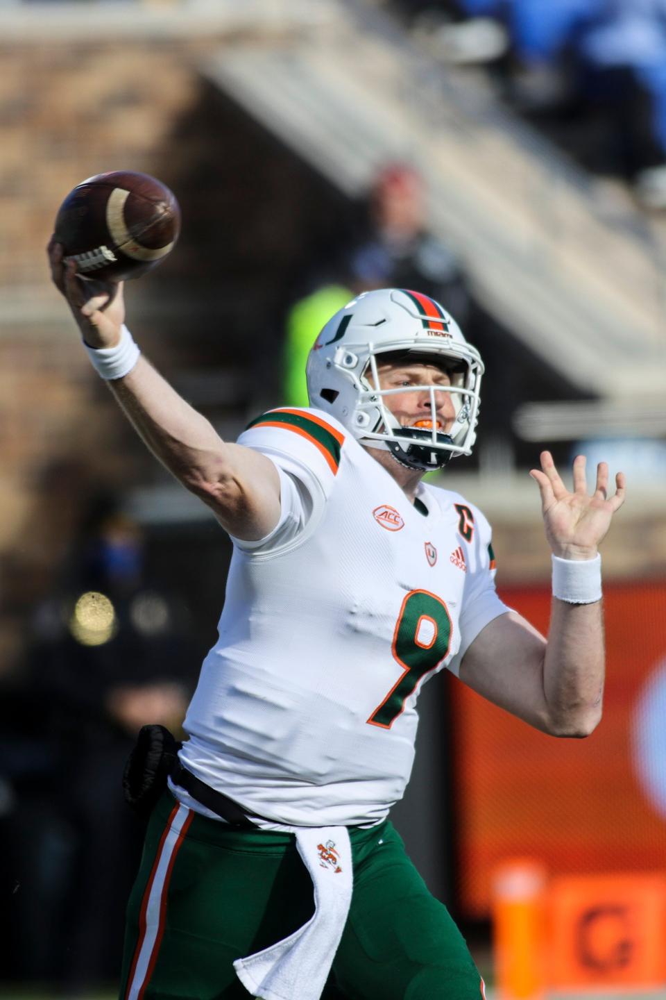 Nov 27, 2021; Durham, North Carolina, USA; Miami Hurricanes quarterback Tyler Van Dyke (9) with the ball during the first half of the game against the Miami Hurricanes at Wallace Wade Stadium. at Wallace Wade Stadium. Mandatory Credit: Jaylynn Nash-USA TODAY Sports