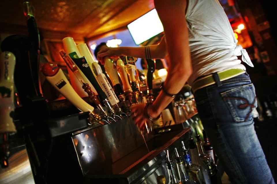 Bartender serving 