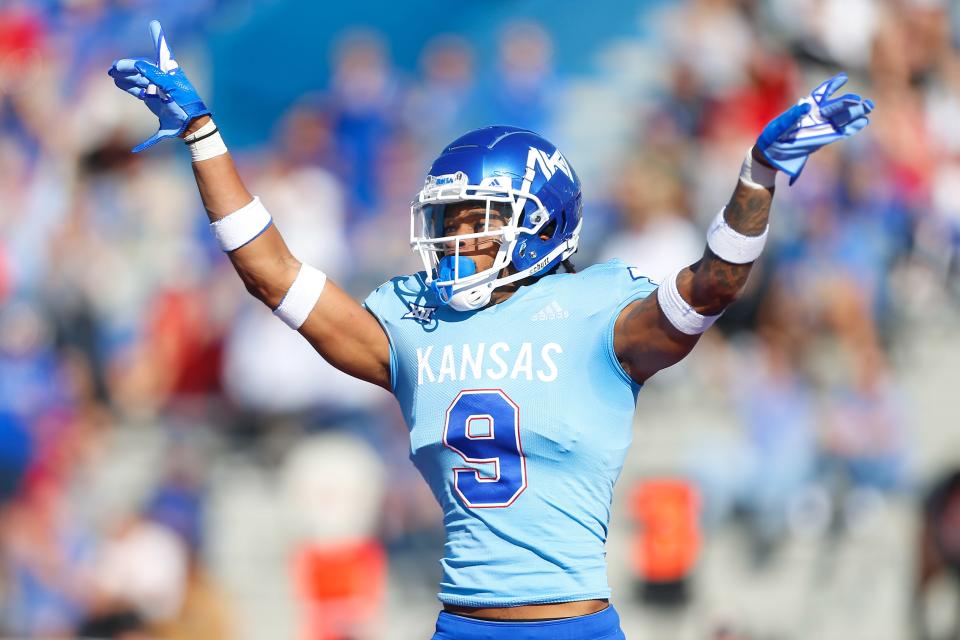 Kansas super senior cornerback Jeremy Webb (9) celebrates a tackle during the first half of Saturday, Oct. 16, 2021 game against Texas Tech at David Booth Kansas Memorial Stadium.