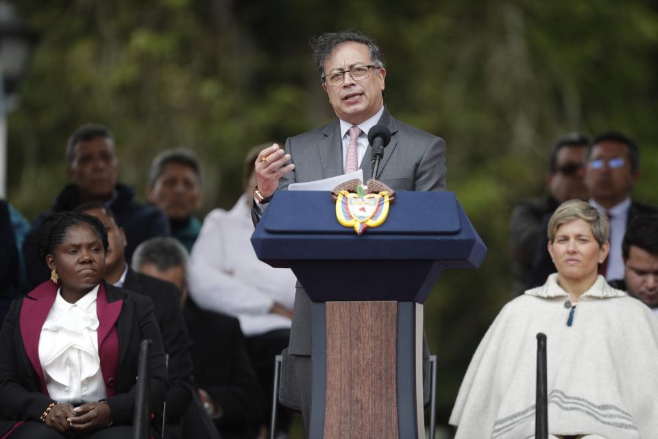 Colombian President Gustavo Petro addresses a ceremony commemorating the battle of Boyaca that sealed Colombia's independence from Spain, in Puente de Boyaca, Colombia, Monday, Aug. 7, 2023. Petro is marking his first year in office, days after his son was charged for alleged illicit enrichment and money laundering in connection with his 2022 campaign funding. (AP Photo/Ivan Valencia)