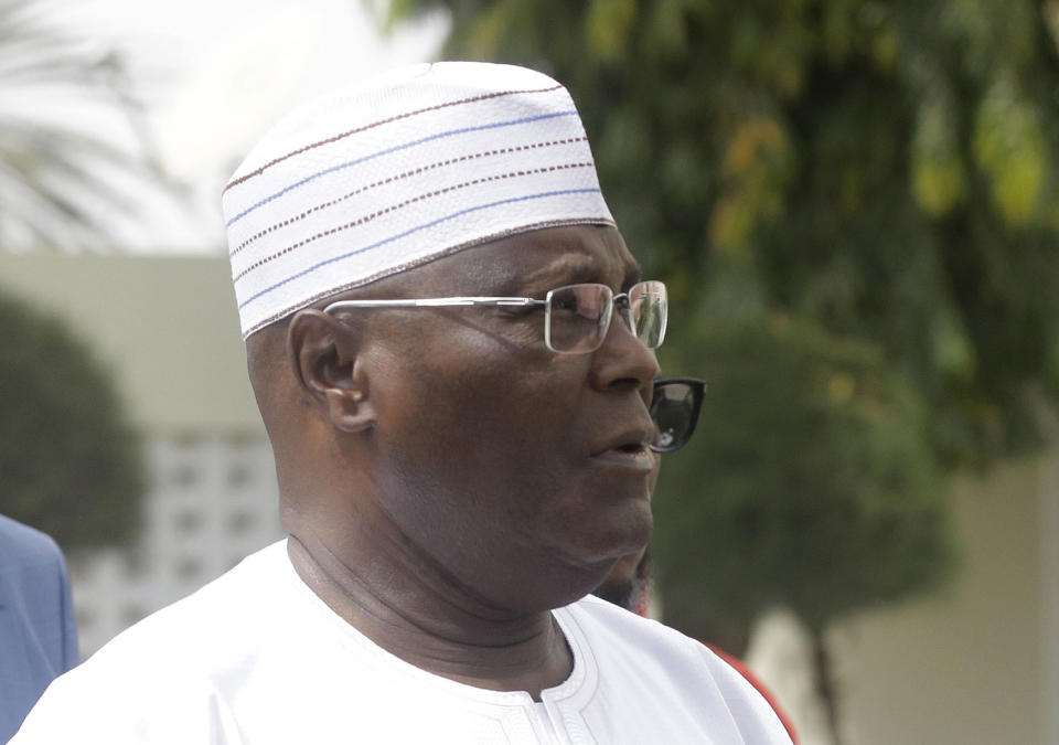 Nigerian presidential candidate, Atiku Abubakar, of the People's Democratic Party, speaks to journalists after the presidential election was delayed by the Independent National Electoral Commission, at his residence in Yola, Nigeria, Saturday, Feb. 16, 2019. A civic group monitoring Nigeria's now-delayed election says the last-minute decision to postpone the vote a week until Feb. 23 "has created needless tension and confusion in the country." (AP Photo/Sunday Alamba)