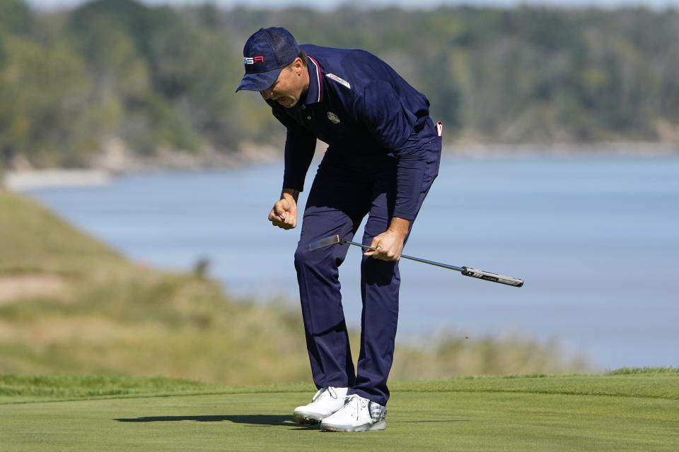 Team USA's Jordan Spieth reacts after making a putt on the 16th hole during a foursomes match the Ryder Cup at the Whistling Straits Golf Course Saturday, Sept. 25, 2021, in Sheboygan, Wis. (AP Photo/Jeff Roberson)