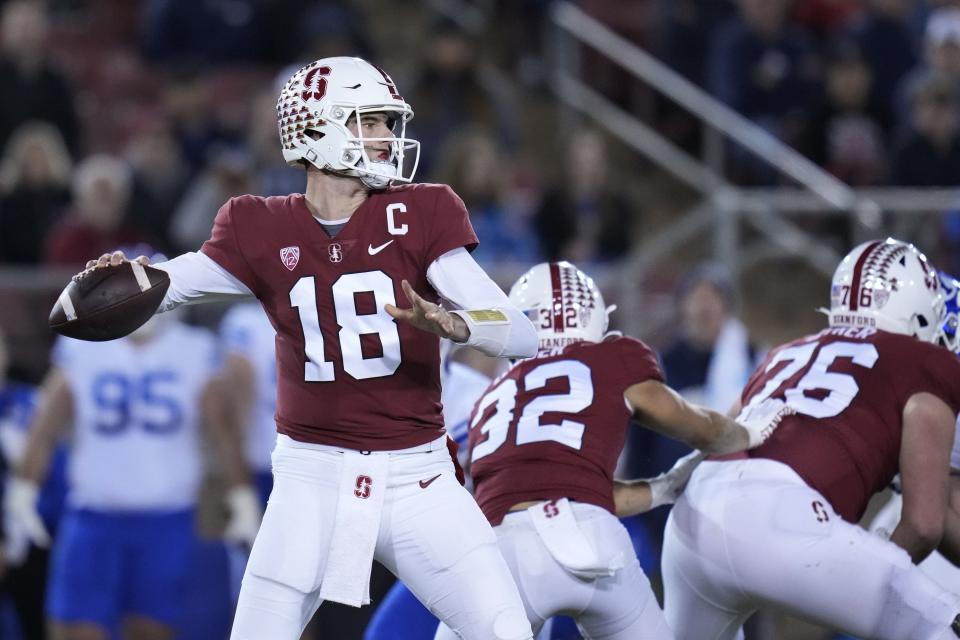 Stanford quarterback Tanner McKee (18) looks for a receiver during the first half of the team’s NCAA college football game against BYU in Stanford, Calif., Saturday, Nov. 26, 2022. | Godofredo A. Vásquez, Associated Press