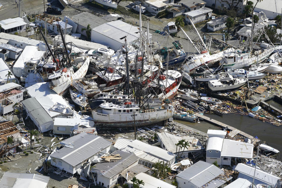 Damaged ships and debris in Fort Myers, Florida, in the aftermath of Hurricane Ian, Sept. 29, 2022