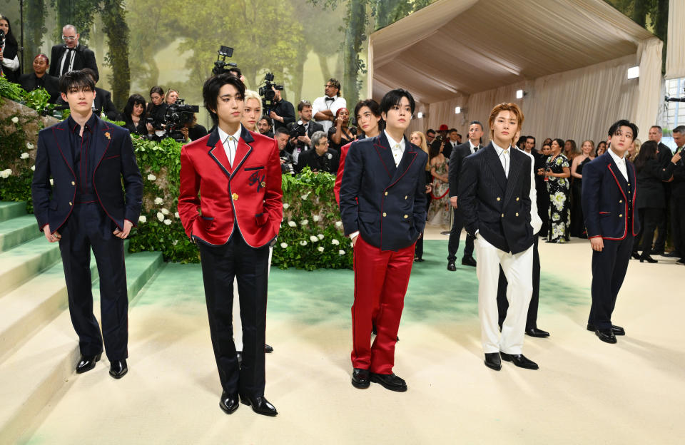 (From L) Bang Chan, Han, Felix, Seungmin, Hyunjin, I.N, Lee Know and Changbin of South Korean boy band Stray Kids arrive for the 2024 Met Gala at the Metropolitan Museum of Art on May 6, 2024, in New York. The Gala raises money for the Metropolitan Museum of Art's Costume Institute. The Gala's 2024 theme is "Sleeping Beauties: Reawakening Fashion." (Photo by Angela WEISS / AFP) (Photo by ANGELA WEISS/AFP via Getty Images)