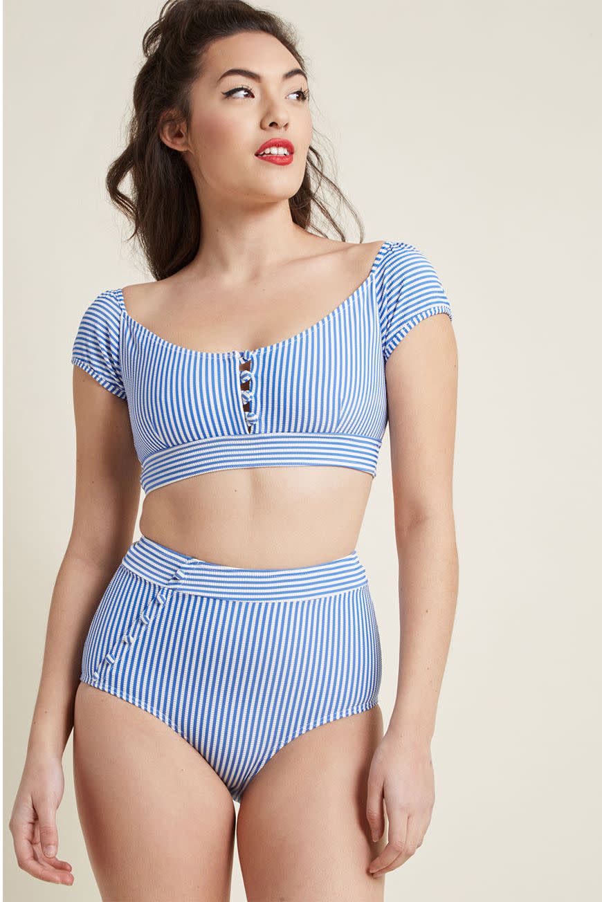 <p><strong>SHOP NOW: </strong>$45, <a href="https://www.modcloth.com/shop/swimwear/seaside-circumstances-high-waisted-bikini-bottom/156564.html" rel="nofollow noopener" target="_blank" data-ylk="slk:modcloth.com;elm:context_link;itc:0;sec:content-canvas" class="link ">modcloth.com</a></p><p>The <a href="https://www.redbookmag.com/fashion/trends/g19861558/retro-vintage-swimwear/" rel="nofollow noopener" target="_blank" data-ylk="slk:retro look;elm:context_link;itc:0;sec:content-canvas" class="link ">retro look</a> is back! Pinstripes, buttons, and super high-waisted bikini bottoms lend to an adorable and comfortable look.</p>