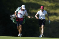 Annika Sorenstam walks up the 11th fairway with her caddie during the first round of the U.S. Women's Open golf tournament at the Pine Needles Lodge & Golf Club in Southern Pines, N.C. on Thursday, June 2, 2022. (AP Photo/Chris Carlson)