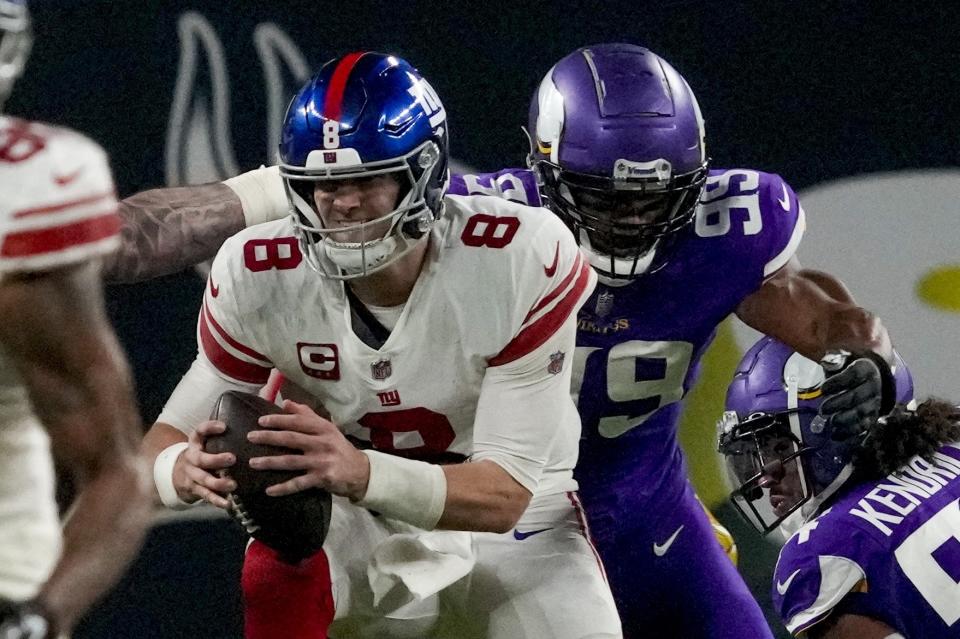 Minnesota Vikings' Danielle Hunter sacks New York Giants' Daniel Jones during the second half of an NFL wild card football game Sunday, Jan. 15, 2023, in Minneapolis. (AP Photo/Charlie Neibergall)