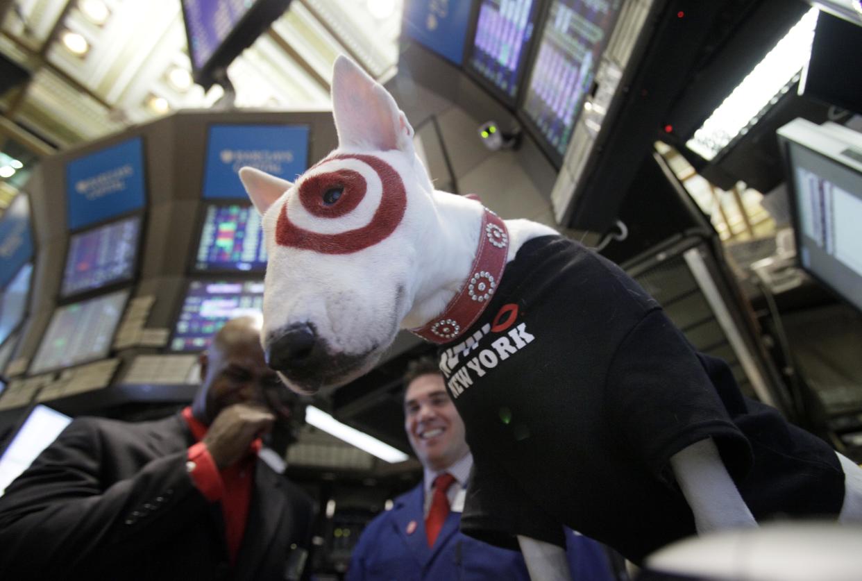 Bullseye, Target stores' mascot dog, is posed for photos from the floor of the New York Stock Exchange, Wednesday, July 21, 2010, after opening bell ceremonies in New York marking the opening of the Target's first store in Manhattan. (AP Photo/Richard Drew)