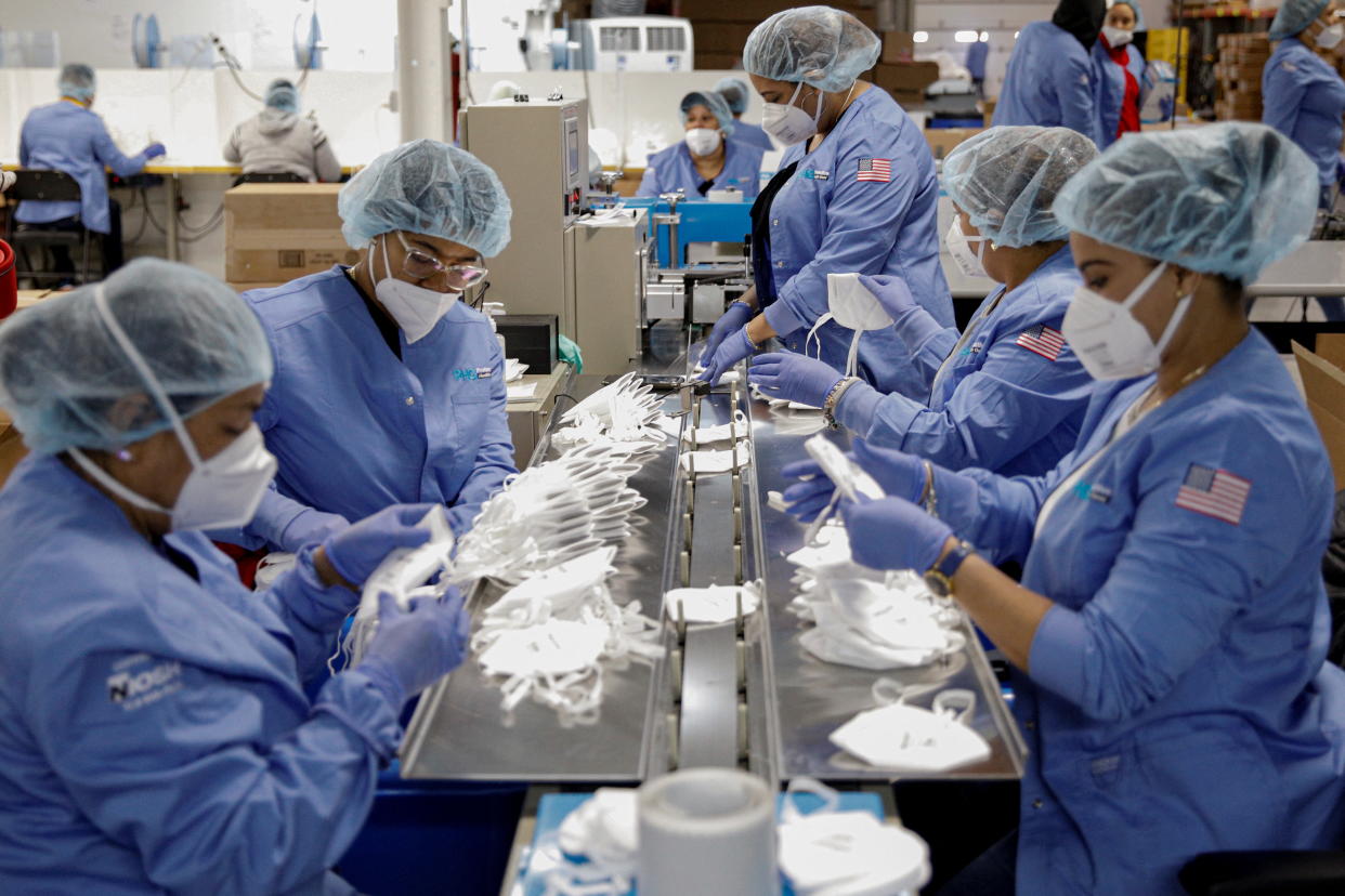 Workers produce N95 respirators in Paterson, N.J. 