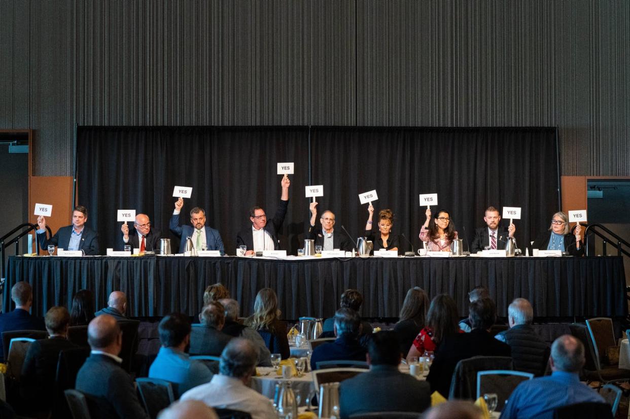<span class="caption">Nine of the 48 candidates for Alaska's lone seat in the U.S. House of Representatives participate in a debate on May 12, 2022, at the Dena'ina Civic and Convention Center in Anchorage. </span> <span class="attribution"><span class="source">Loren Holmes / ADN</span></span>