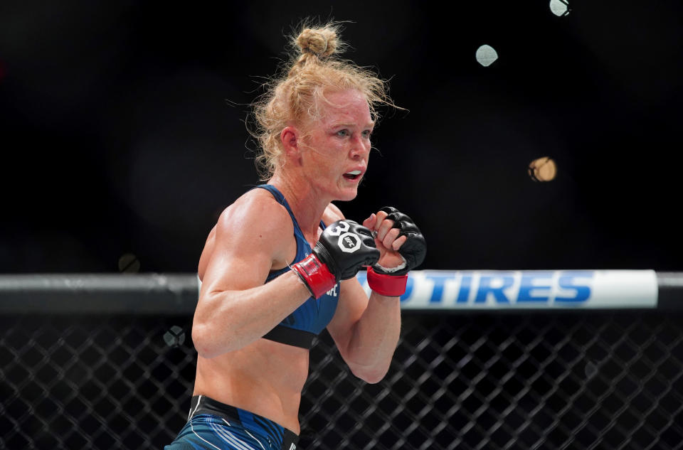 Mar 25, 2023; San Antonio, Texas, USA; Holly Holm (red gloves) fights Yana Santos (not pictured) during UFC Fight Night at AT&T Center. Mandatory Credit: Aaron Meullion-USA TODAY Sports
