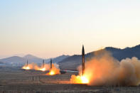 <p>North Korean leader Kim Jong Un supervises a ballistic rocket launching drill of Hwasong artillery units of the Strategic Force of the KPA on the spot in this undated photo. (KCNA/Reuters) </p>